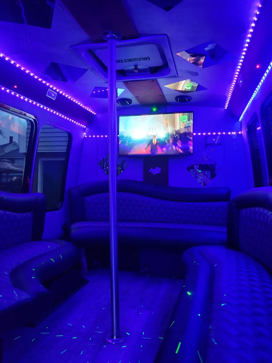 Party bus interior with blue accent lighting